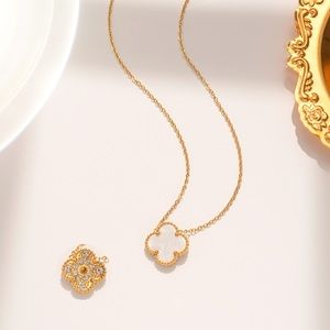 Reversible crystal embellished white clover gold necklace